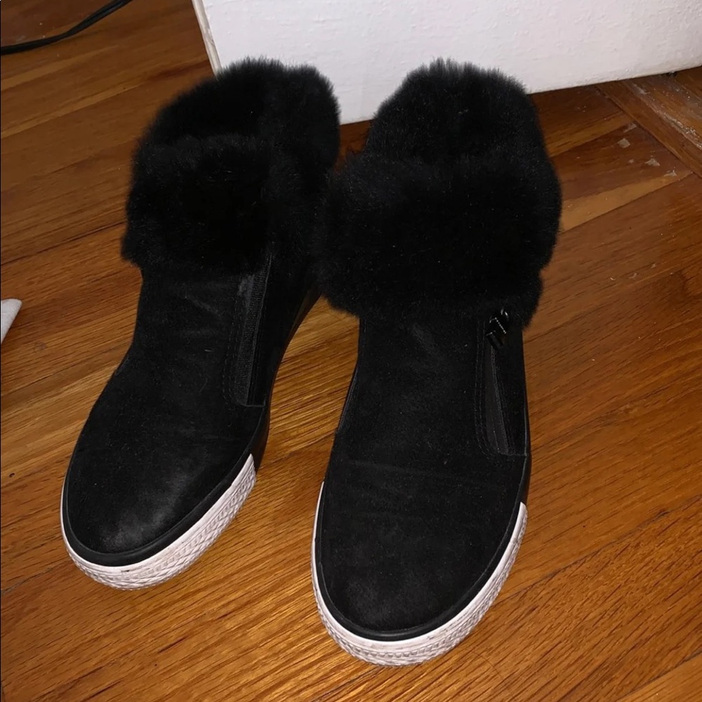 hightop sneakers with black fur at the ankle